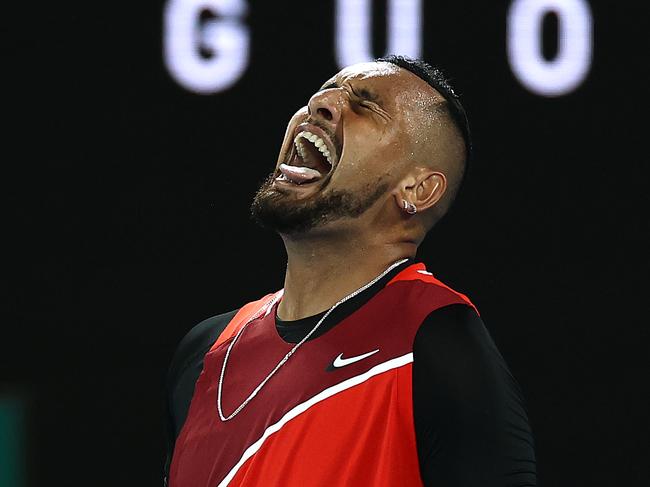 MELBOURNE, AUSTRALIA - JANUARY 20: Nick Kyrgios of Australia reacts in his second round singles match against Daniil Medvedev of Russia during day four of the 2022 Australian Open at Melbourne Park on January 20, 2022 in Melbourne, Australia. (Photo by Cameron Spencer/Getty Images)