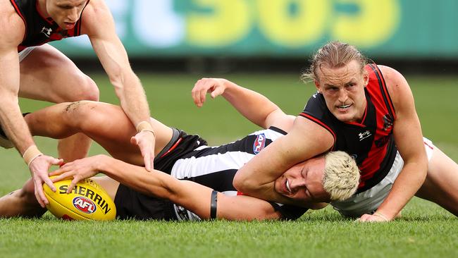 Mason Redman tackles Jack Ginnivan . Picture: Mark Stewart