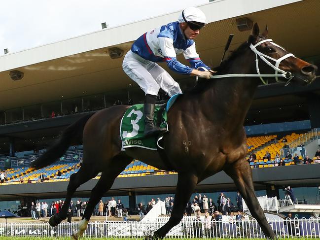 SYDNEY, AUSTRALIA - JUNE 29: Rory Hutchings riding Speycaster   wins Race 3 James Squire Stayer's Cup during "McKell Cup Day" - Sydney Racing at Rosehill Gardens on June 29, 2024 in Sydney, Australia. (Photo by Jeremy Ng/Getty Images)