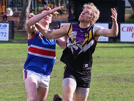 Leigh Williams tussles with South Croydon defender Chris Jones. Picture: Eastern Sporting Images