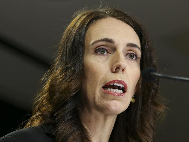 WELLINGTON, NEW ZEALAND - MARCH 25: Prime Minister Jacinda Ardern speaks to media at a press conference ahead of a nationwide lockdown at Parliament on March 25, 2020 in Wellington, New Zealand. New Zealand Prime Minister Jacinda Ardern on Wednesday declared a State of National Emergency in response to combat the ongoing COVID-19 pandemic. The declaration allows the Director Civil Defence Emergency Management to direct and coordinate personnel, material and other resources, and provides access to other extra-ordinary powers that will support delivery of an effective and timely response to COVID-19. An Epidemic Notice has also been issued to help ensure the continuity of essential Government business.New Zealand will go into lockdown from 11:59 Wednesday night, as the COVID-19 alert level rises to four. All non-essential businesses will close at that time, including bars, restaurants, cinemas and playgrounds. Schools are closed and all indoor and outdoor events are banned. Essential services will remain open, including supermarkets and pharmacies. The New Zealand Prime Minister Jacinda Ardern expects measures will remain in place for about four weeks, and has said there will be zero tolerance for people ignoring the restrictions, with police able to enforce them if required. New Zealand currently has 155 confirmed cases of COVID-19. (Photo by Hagen Hopkins/Getty Images)