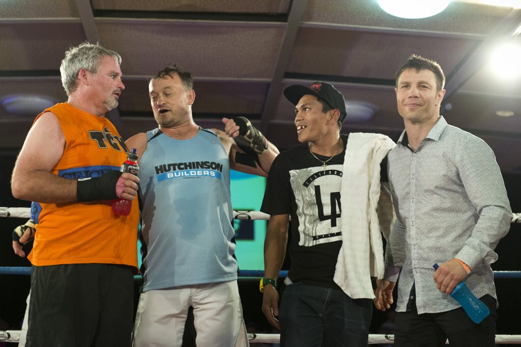 Fundraising bout participants (from left) John Geiger, Nick Barker with Jack Asis and Michael Katsidis battle it out at Smithy and TGW Bring The Big Fights 14 at Rumours International, Saturday, October 22, 2016. Picture: Kevin Farmer