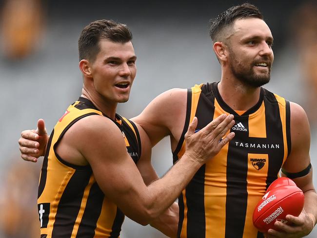 MELBOURNE, AUSTRALIA - MARCH 20: Jaeger O'Meara and Jack Gunston of the Hawks celebrate winning the round one AFL match between the Hawthorn Hawks and the North Melbourne Kangaroos at Melbourne Cricket Ground on March 20, 2022 in Melbourne, Australia. (Photo by Quinn Rooney/Getty Images)