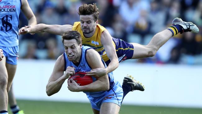 Fraser Evans marks for Sturt in front of the Eagles’ Jack Gaffney. Picture: Sarah Reed