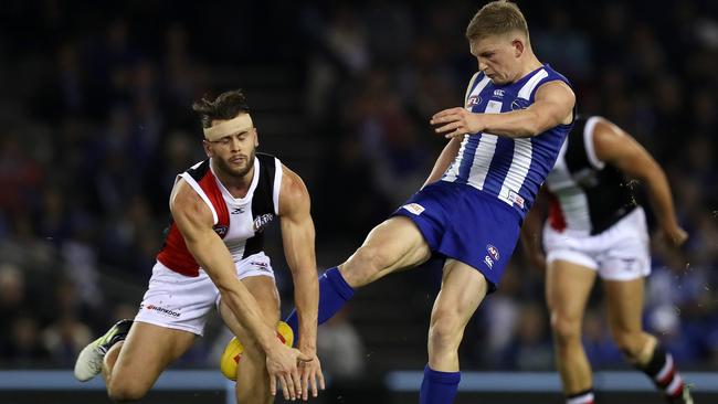 Mav Weller smoothers Jack Ziebell’s kick. Picture: Michael Klein