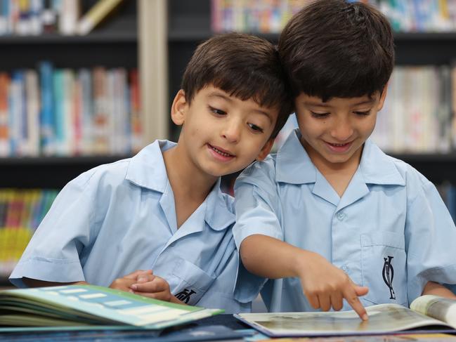 Back to School. Identical twin brothers Maximus and Domadius Missiha who are starting prep this year at Our Lady of Lourdes school. The boys came from interstate so they're new to Melbourne.                                                             Picture: David Caird