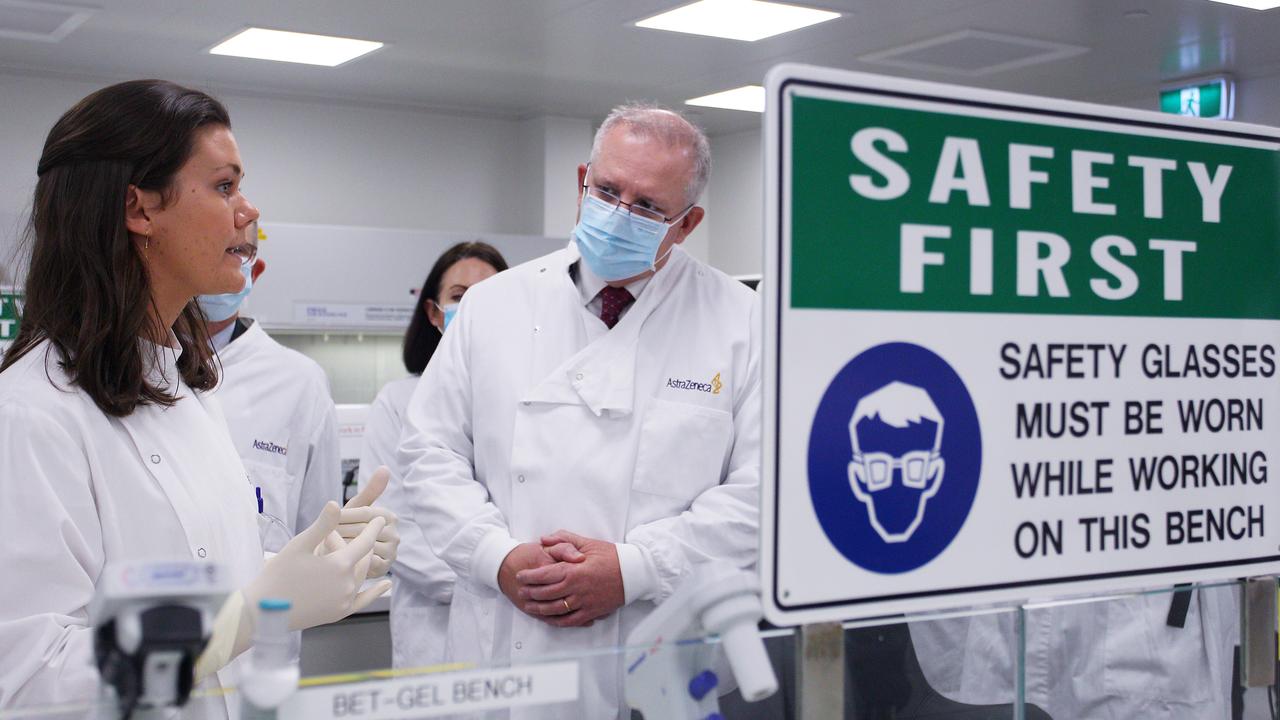 Scott Morrison meets with Savannah Alegre, specialist team lead of the microbiology laboratory at AstraZeneca, after announcing an agreement with AstraZeneca to secure a COVID-19 vaccine if it passes clinical trials. Picture: Lisa Maree Williams/Getty Images