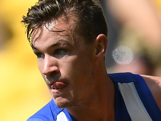 Kayne Turner of the Kangaroos is seen in action during the Round 1 AFL match between the North Melbourne Kangaroos and West Coast Eagles at Etihad Stadium in Melbourne, Sunday, March 26, 2017. (AAP Image/Julian Smith) NO ARCHIVING, EDITORIAL USE ONLY