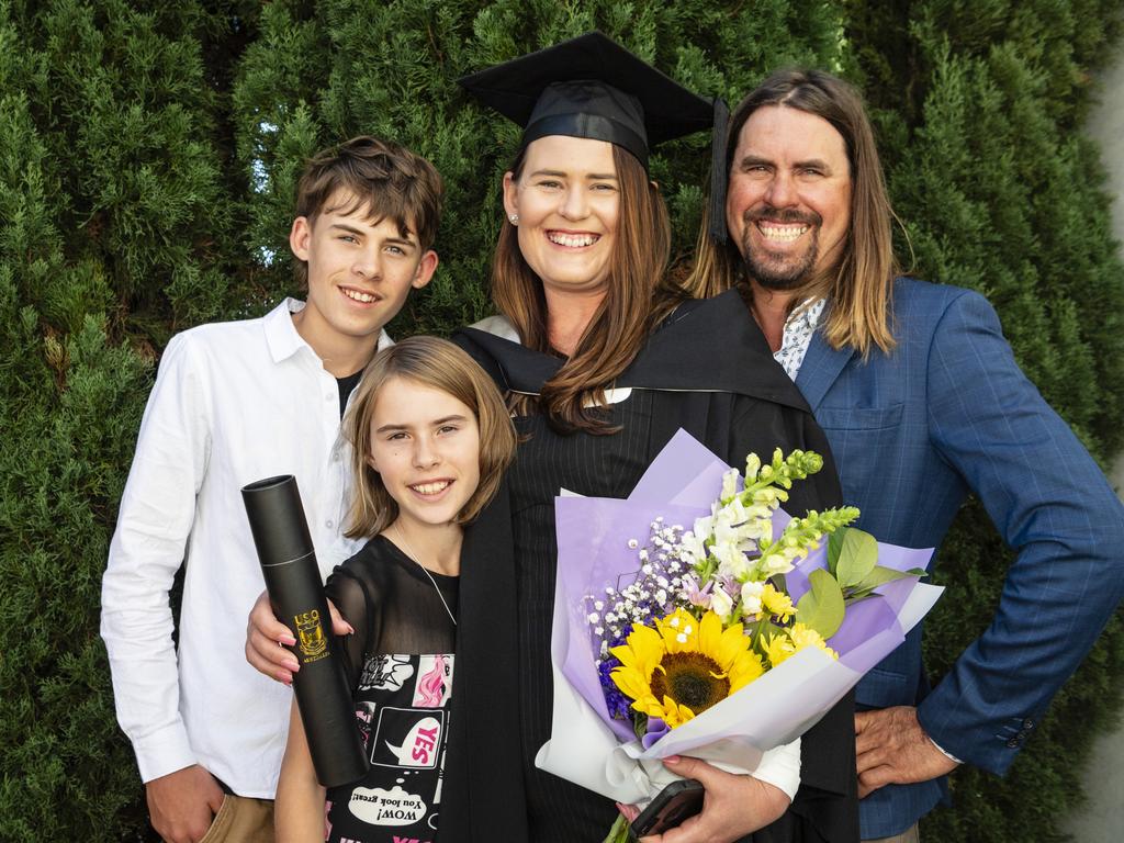 South Burnett Regional Council Cr Kirstie Schumacher celebrates her Bachelor of Communication and Media with son Decklan, daughter Grace and husband Wayne Schumacher at a UniSQ graduation ceremony at Empire Theatres, Tuesday, June 27, 2023. Picture: Kevin Farmer