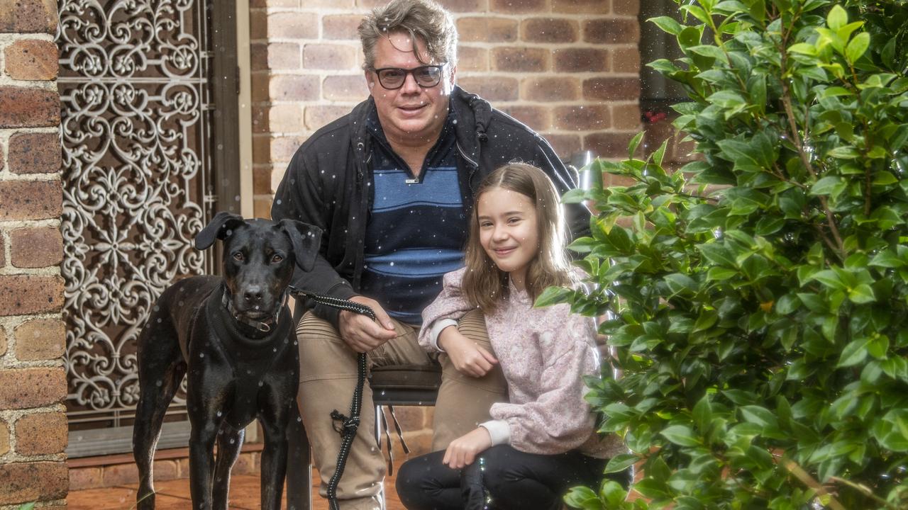 Thom Roker with his daughter Poppy-Jo Roker and dog Vincent. Picture: Nev Madsen.