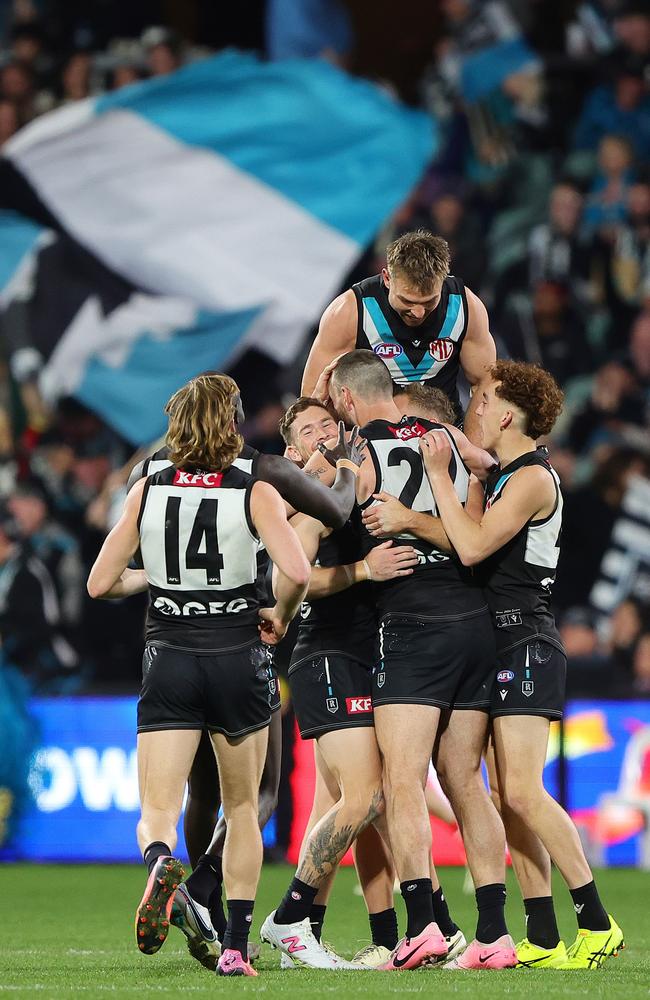 The Power celebrate during its record-breaking win over the Swans. Picture: Sarah Reed/AFL Photos