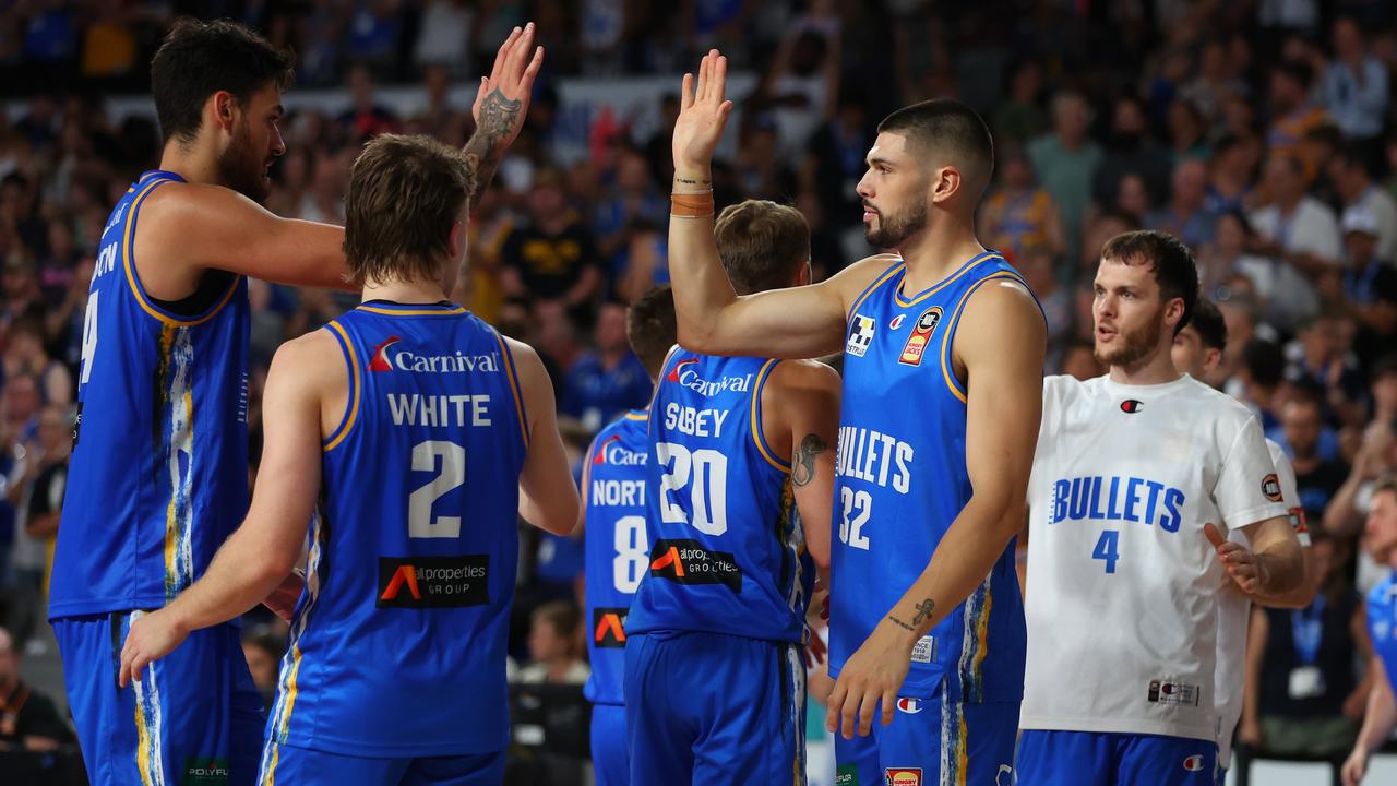 Brisbane Bullets celebrate winning against the Illawarra Hawks. Picture: Chris Hyde/Getty Images