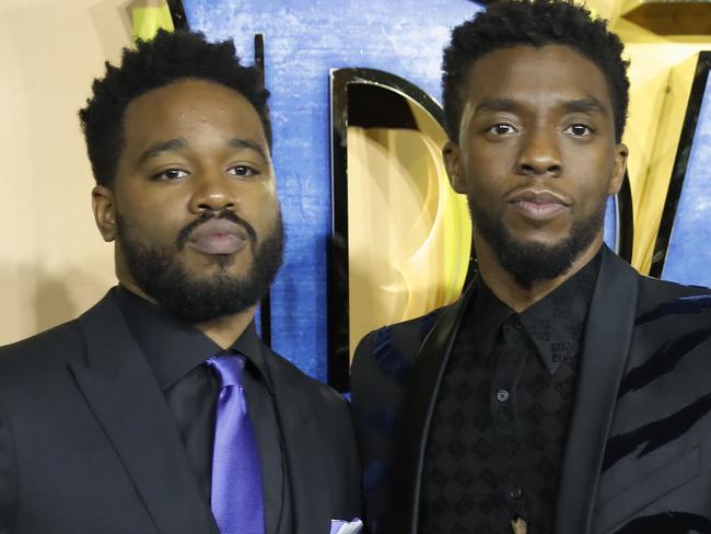 American director Ryan Coogler (L) and American actor Chadwick Boseman pose on arrival for the European Premiere of 'Black Panther' in central London on February 8, 2018. / AFP PHOTO / Tolga AKMEN