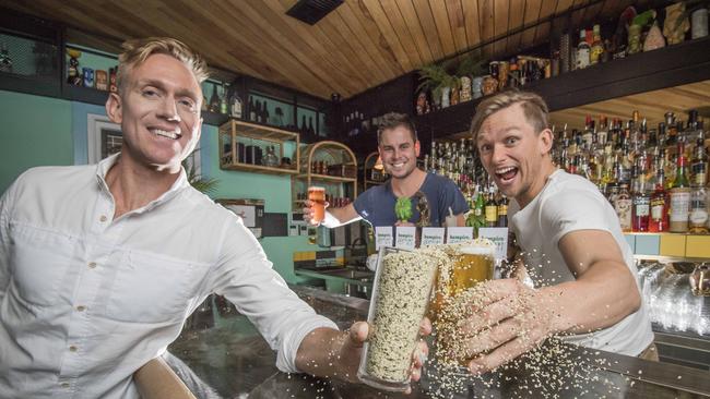 Beer creators Josh Lefers, Benjamin Cairns and Stephen Wools, pictured with hemp seeds, are the founders of East 9th Brewing. Picture: Jason Edwards