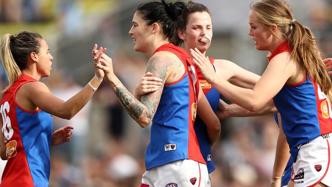 Tegan Cunningham celebrates after kicking a goal for the Demons. Picture: Getty Images