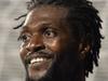 Tottenham Hotspur's Togolese striker Emmanuel Adebayor gestures during the UEFA Europa League group C football match between Tottenham Hotspur and Asteras Tripolis at White Hart Lane in north London, on October 23, 2014. AFP PHOTO / GLYN KIRK