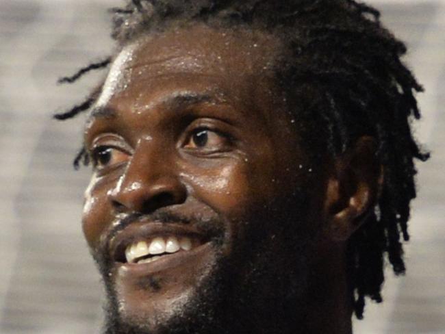 Tottenham Hotspur's Togolese striker Emmanuel Adebayor gestures during the UEFA Europa League group C football match between Tottenham Hotspur and Asteras Tripolis at White Hart Lane in north London, on October 23, 2014. AFP PHOTO / GLYN KIRK