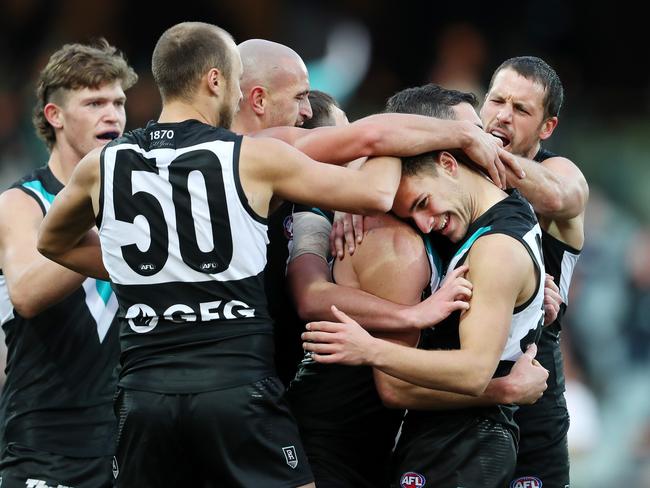 AFL - Saturday, 8th August, 2020 - Port Adelaide v Richmond at the Adelaide Oval. Port Adelaide's Boyd Woodcock gets his first goal celebration with team mates Picture: Sarah Reed