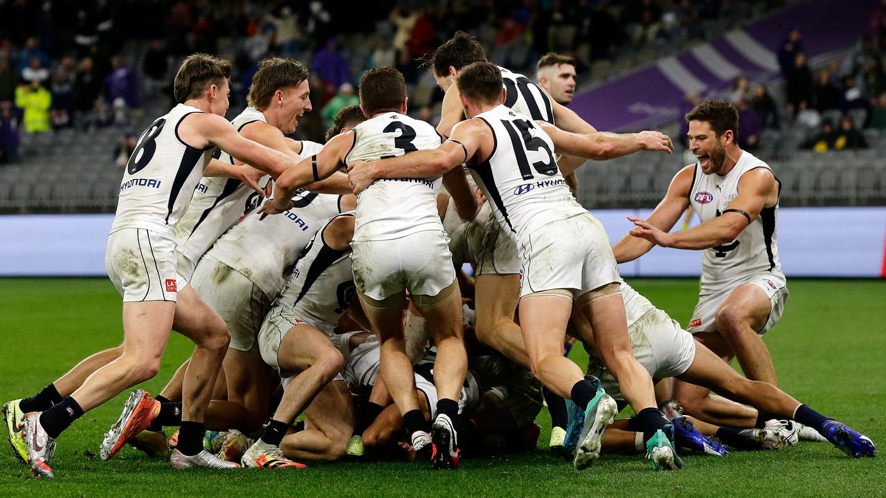 Carlton players celebrate Jack Newnes’ post-siren, match-winning goal against Fremantle. (Photo by Will Russell/AFL Photos via Getty Images)