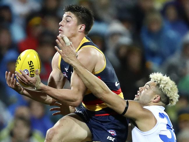 AFL - Adelaide Crows v Western Bulldogs at Adelaide Oval. Riley Knight marks infront of Jason Johannisen. Picture Sarah Reed