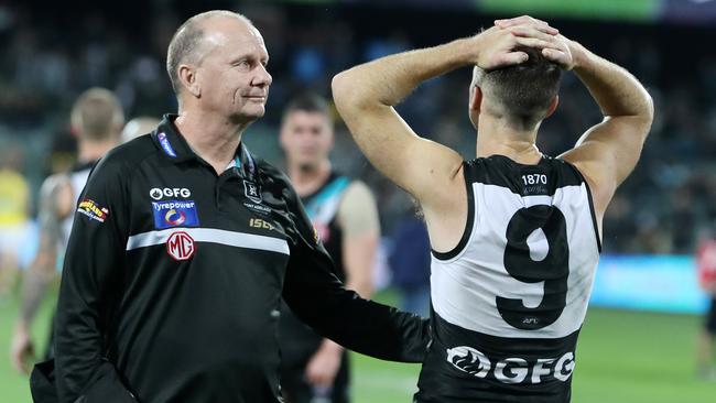 Hinkley consoles Robbie Gray who at 32 is running out of chances for an elusive flag in his career. Picture: Sarah Reed.