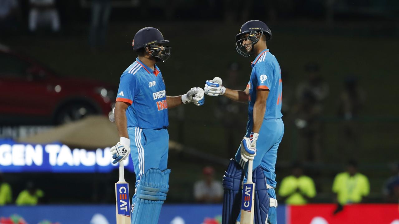 Rohit Sharma and Shubman Gill of India (R) bump fists during the Asia Cup Group A match between India and Nepal.