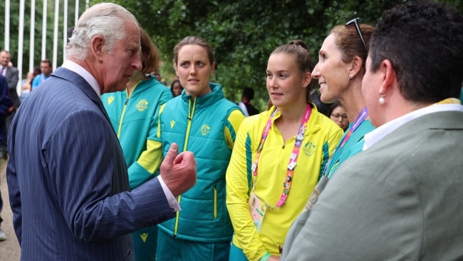 Prince Charles speaks to members of the Australian swimming team. Picture: Getty Images