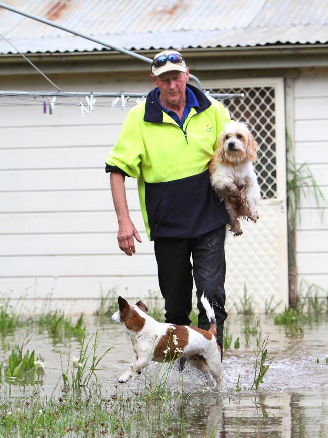 Murray Sullivan and his dogs Jet and Charlie have not been able to go home. Picture: Dean Marzolla