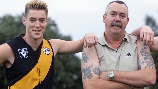 Former Tiger and Bulldog strongman Robert McGhie with Lucas in 2002.