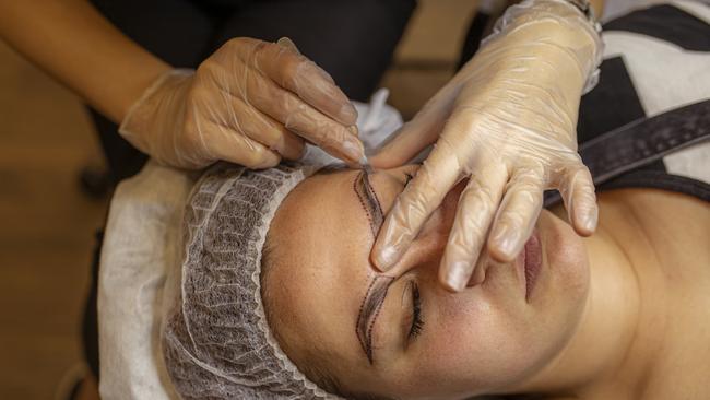 The at-home business would offer eyebrow Microblading (tattooing). Photo: Istock/ Dusan Stankovic