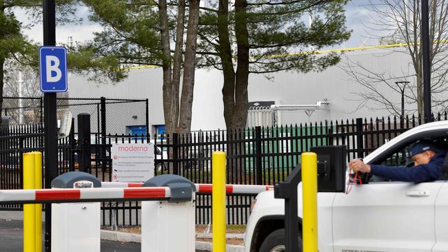 A worker passes through the security gate at a Moderna campus near Boston in Massachusetts on Wednesday. Picture: AFP )