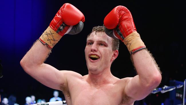 Jeff Horn of Australia celebrates winning his welterweight bout against Randall Bailey.
