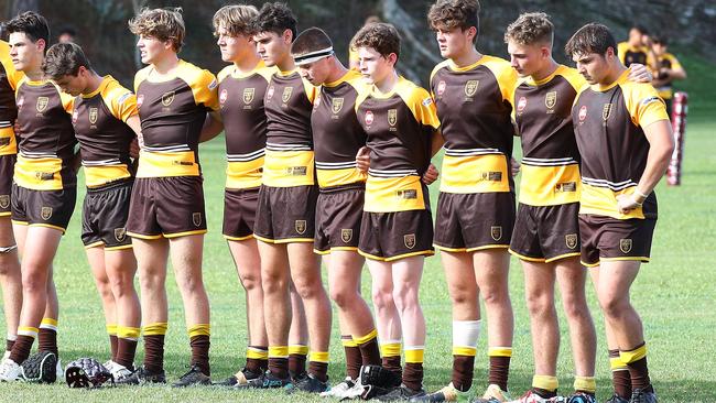 Mitch Rogers, middle right, with his black gear on the ground in front of him. Picture: Tertius Pickard