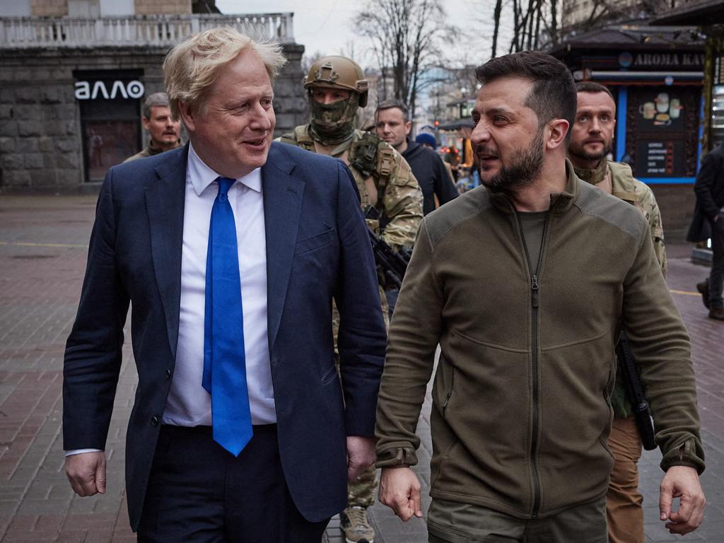 British Prime Minister Boris Johnson and Ukrainian President Volodymyr Zelenskyy walking in central Kyiv in a "show of solidarity" with Ukraine a day after a missile strike killed dozens at a railway station. Picture: AFP