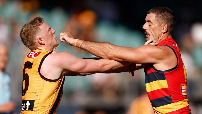 James Sicily and Taylor Walker go toe to toe. Picture: Michael Willson/AFL Photos via Getty Images