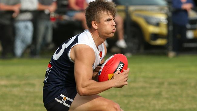 Ballarat FL footy: Melton South v Bacchus Marsh: William Thornton-Gielen of Melton South marksSaturday, May 1, 2021, in Melton, Victoria, Australia. Picture: Hamish Blair