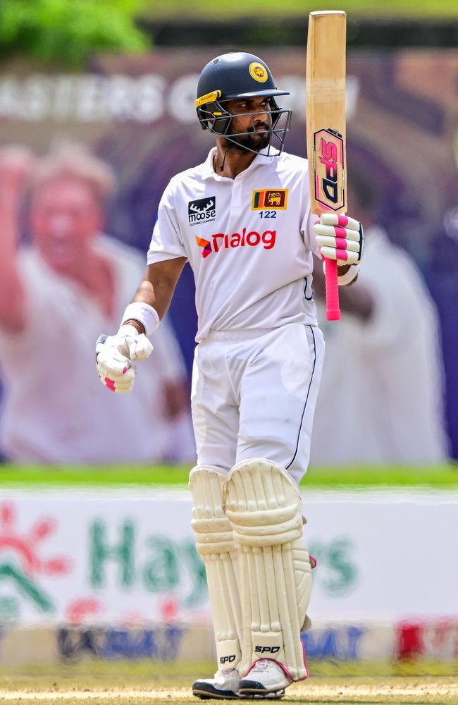 Sri Lanka's Dinesh Chandimal celebrates after scoring a half-century. Picture: AFP