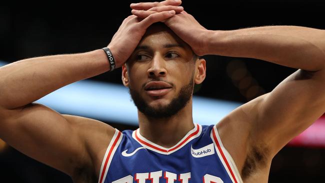 WASHINGTON, DC - DECEMBER 05: Ben Simmons #25 of the Philadelphia 76ers reacts against the Washington Wizards during the first half at Capital One Arena on December 5, 2019 in Washington, DC. NOTE TO USER: User expressly acknowledges and agrees that, by downloading and or using this photograph, User is consenting to the terms and conditions of the Getty Images License Agreement.   Patrick Smith/Getty Images/AFP == FOR NEWSPAPERS, INTERNET, TELCOS & TELEVISION USE ONLY ==