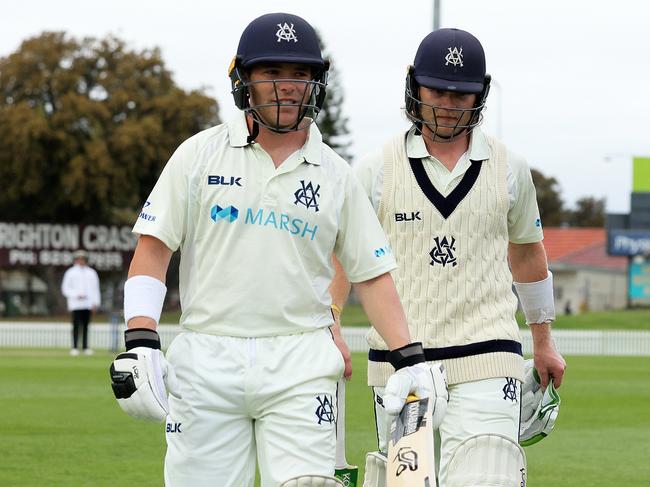 Marcus Harris of Victoria and Will Pucovski of Victoria walk from the ground unbeaten on day two. Picture: Daniel Kalisz/Getty Images