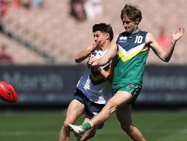 Thomas McGuane gets a kick away. Picture: Daniel Pockett/AFL Photos