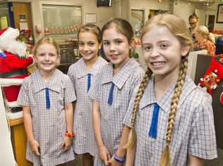 VOICES AT ST VINCENTS: Spreading Christmas cheer to patients at St Vincents Hospital are Mater Dei Primary School students (from left) Zia Foster, Emma Holzheimer, Ruby Surawski and Olivia Nason. Tuesday, 4th Dec, 2018. Picture: Nev Madsen