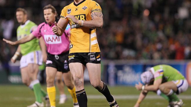 CANBERRA, AUSTRALIA - SEPTEMBER 17: Simon Dwyer of the Tigers celebrates after Jarrod Croker of the Raiders misses a shot at goal during the first NRL semi final match between the Canberra Raiders and the Wests Tigers at Canberra Stadium on September 17, 2010 in Canberra, Australia. (Photo by Stefan Postles/Getty Images)