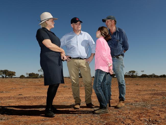 Prime Minister Scott Morrison meets with sheep and cattle graziers Annabel and Stephen Tully and their daughter Eve. Picture: Alex Ellinghausen