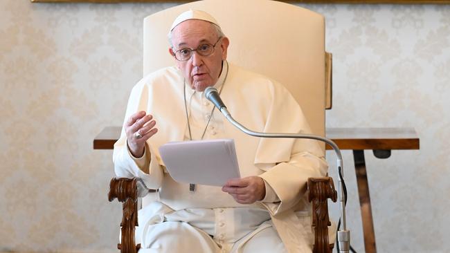 Pope Francis addressing a live-streamed weekly private audience from the library of the apostolic palace in The Vatican. Picture: AFP