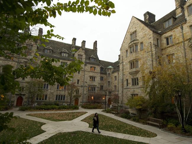 (FILES) In this file photo a  Yale University student is seen on campus on November 8, 2010 in New Haven, Connecticut. - The Justice Department accused Yale University on August 13, 2020 of violating US civil rights law by illegally discriminating against white and Asian American applicants. The department's finding -- which Yale rejected as "meritless" -- came after a two-year investigation into the undergraduate admissions process at the prestigious Ivy League university in New Haven, Connecticut. (Photo by Don EMMERT / AFP)