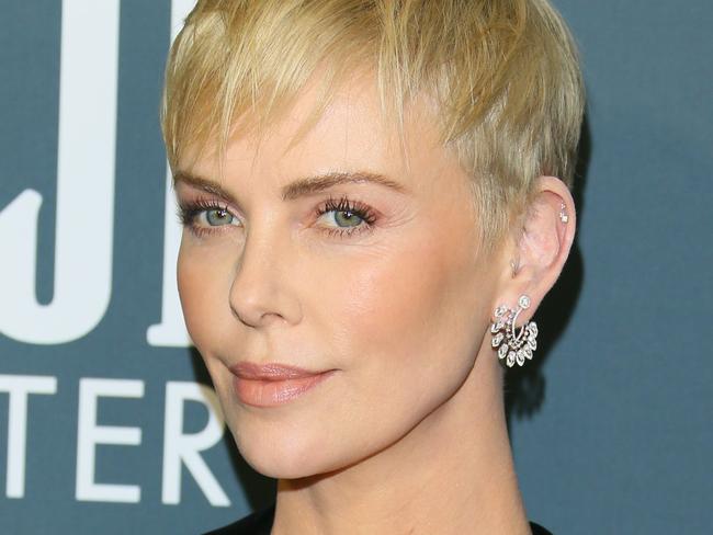 US-South African actress Charlize Theron arrives for the 25th Annual Critics' Choice Awards at Barker Hangar Santa Monica airport on January 12, 2020 in Santa Monica, California. (Photo by Jean-Baptiste LACROIX / AFP)