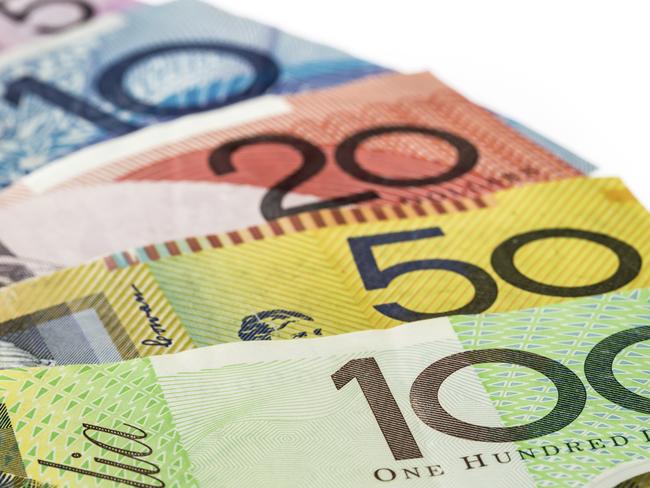 Australia Money, Australian Dollar Closeup, American One Hundred Dollar Bill, Australia, Australian Currency, Australian Dollar Note, Banking, Banknote, Bringing Home The Bacon, Business, Corporate Business, Currency, Differential Focus, Finance, Growth, Horizontal, Image Focus Technique, Investment, No People, One Hundred Dollar Bill, Paper, Photography, Savings, US Currency, US Dollar Note, Wealth, generic, thinkstock, istock, AUD, Aussie Dollars