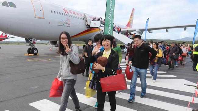 Crowds coming off the plane after the first flight in 2016. Picture Mike Batterham