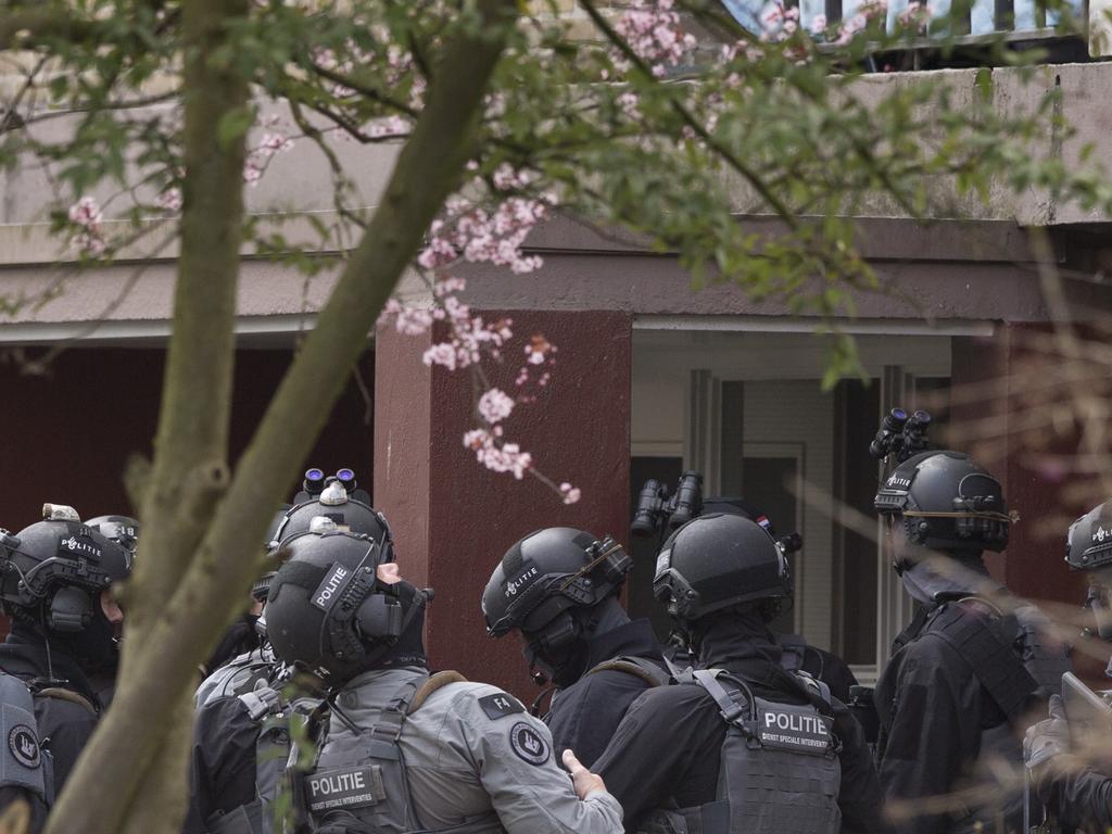 Dutch counter terrorism police prepare to enter a house after a shooting incident in Utrecht, Netherlands. Picture: AP