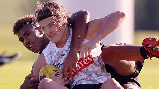 Collingwood training at Olympic Park.  03/06/2021 .  Jack Ginnivan tackled by Isaac Quaynor   .  Pic: Michael Klein